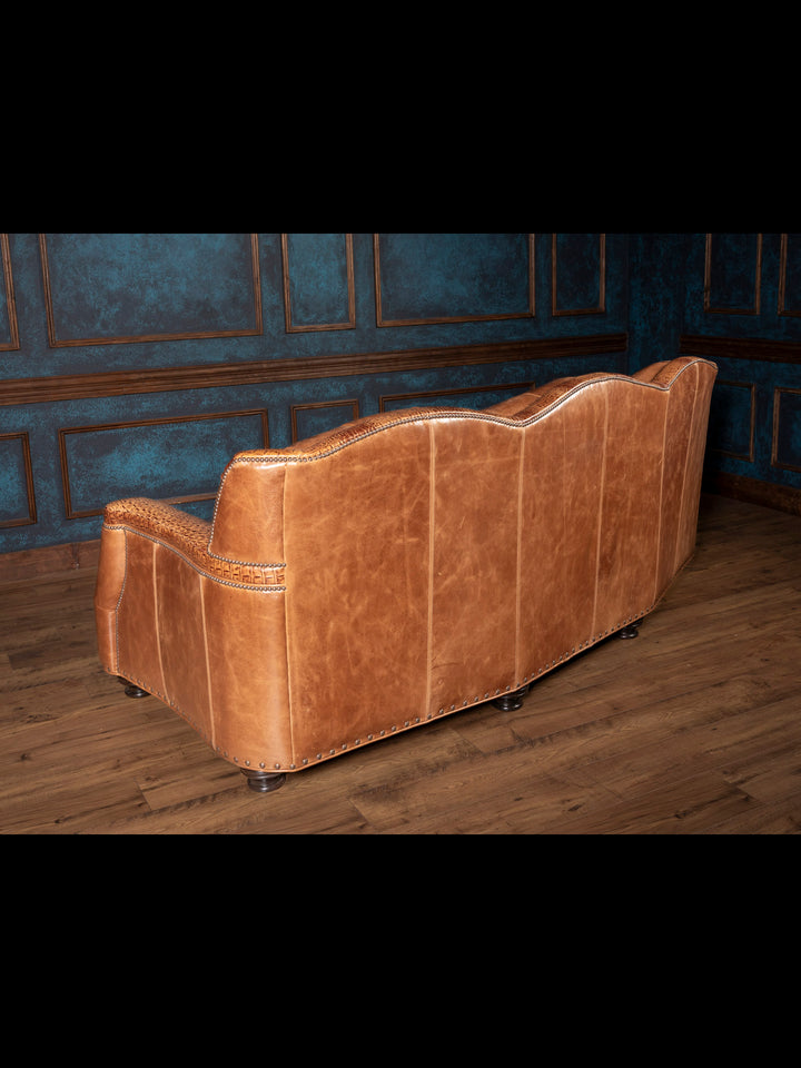 Back side of the brown leather sofa