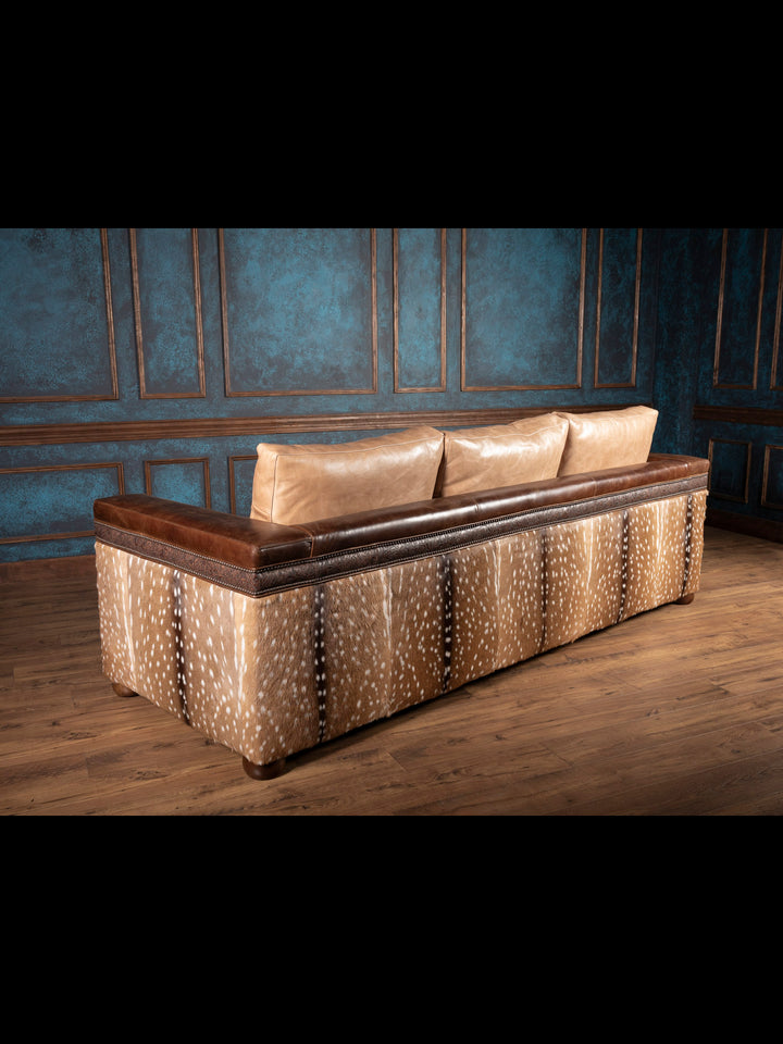 Back view of handcrafted Sandstone Axis Leather Sofa featuring bold axis deer hide and refined leather finishes