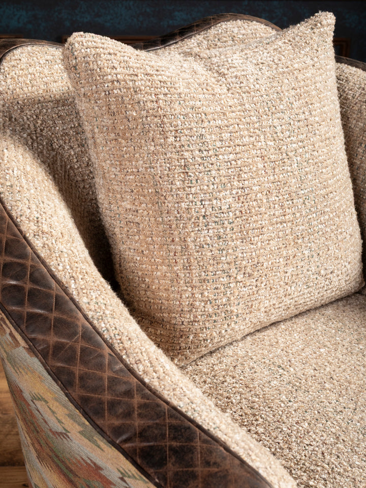 Close-up of cushion and fabric texture:
Neutral boucle fabric seat and back cushion on swivel chair