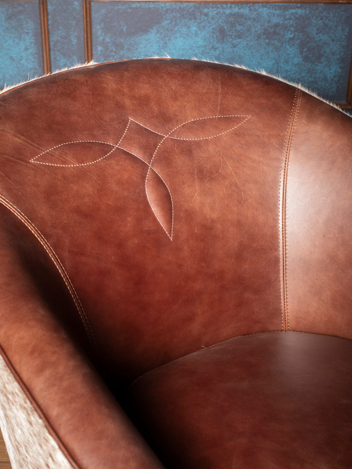 Boot stitch design on inside back of chocolate brown Western leather accent chair