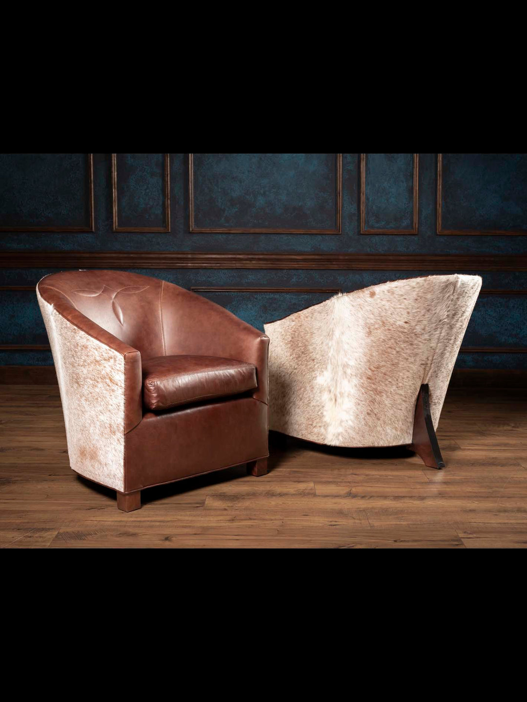 Pair of speckled cowhide and chocolate brown leather accent chairs shown front and back