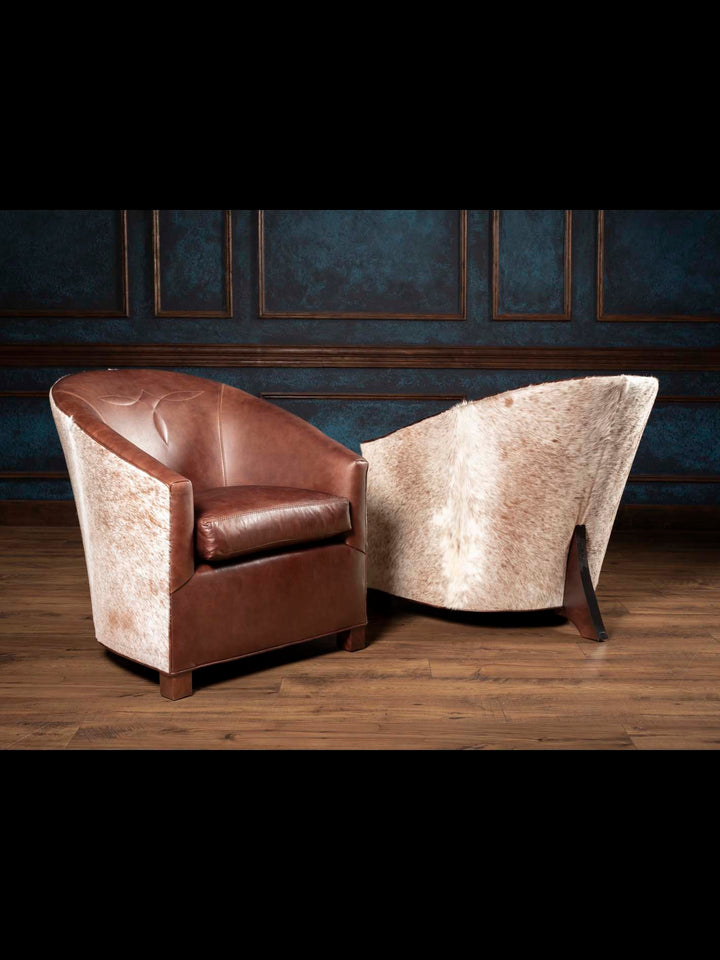 Pair of speckled cowhide and chocolate brown leather accent chairs shown front and back