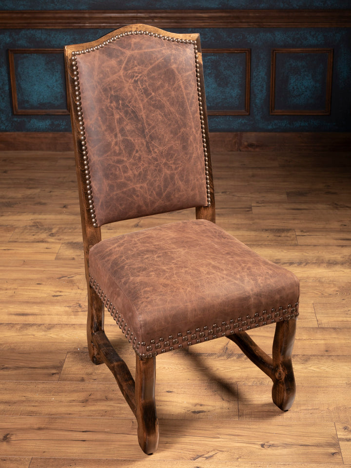 Angled front view of leather dining chair