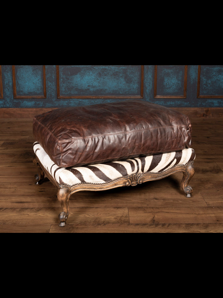 Safari Reserve Zebra Leather Ottoman with full-grain leather cushion and authentic zebra hide