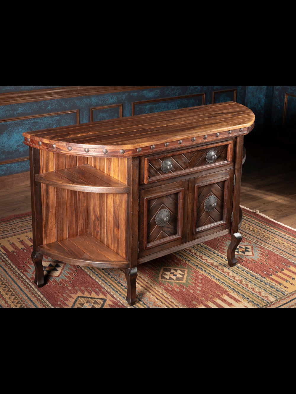 Wooden sideboard with decorative elements on a patterned rug