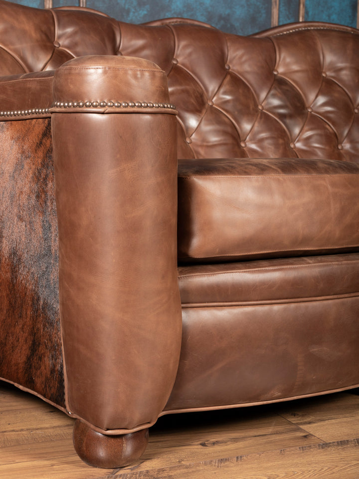 Seat and front panel close-up: brown leather seat cushion 