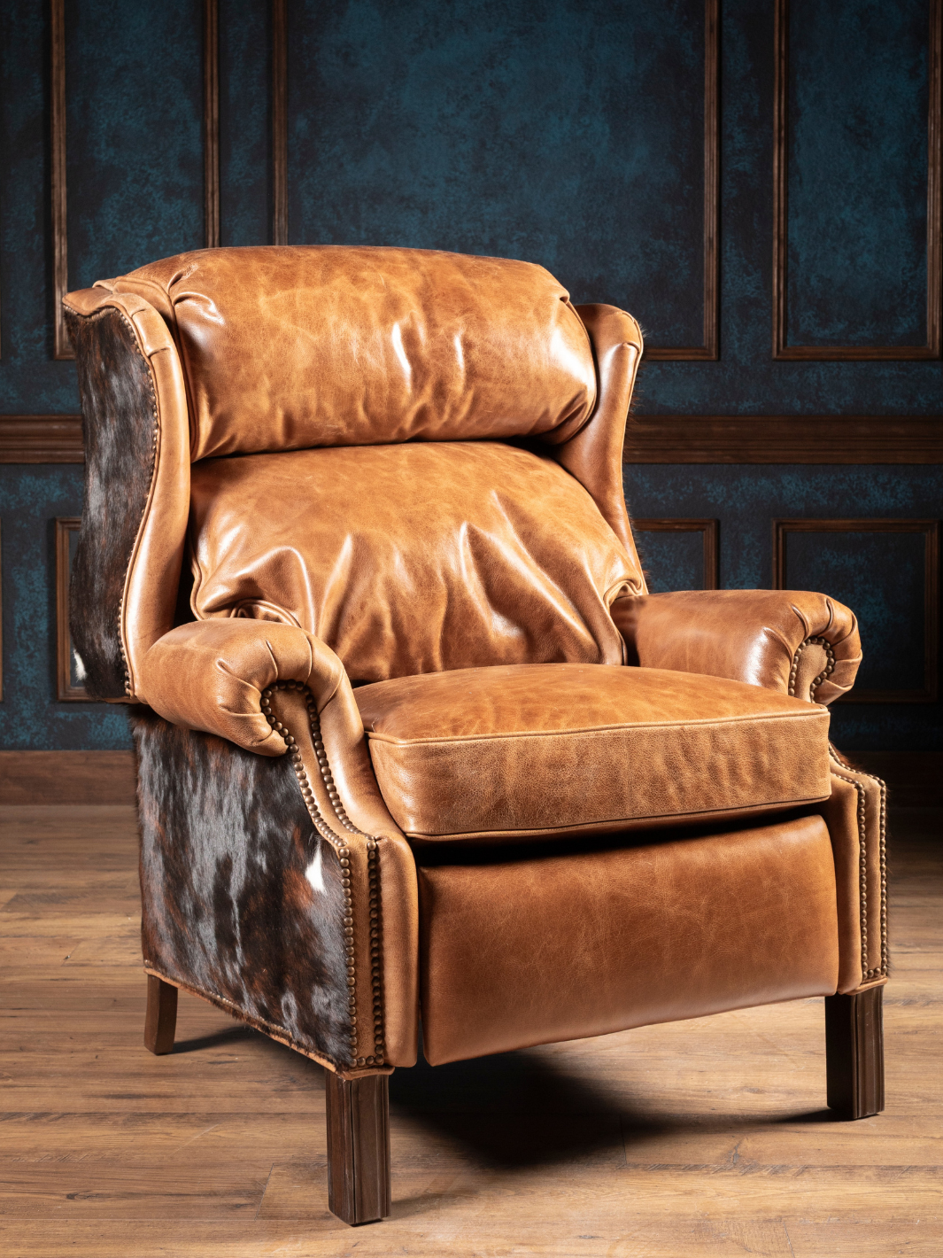 Brindle Ridge Leather Recliner in Cambridge Sycamore leather with cowhide accents in a Western living room.