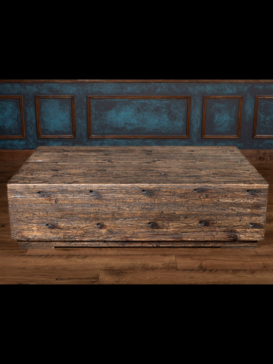 Reclaimed Oak Beam Coffee Table with brown distressed wood in rustic living room.