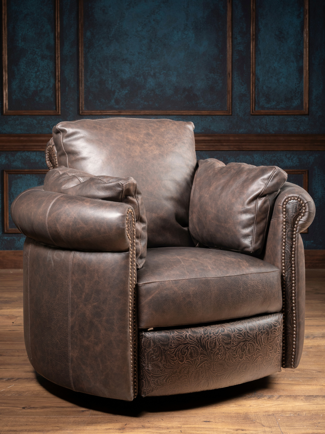 Dusk Leather Snug Swivel Recliner in West Coffee leather with floral tooled leather accents, styled in a western living room.