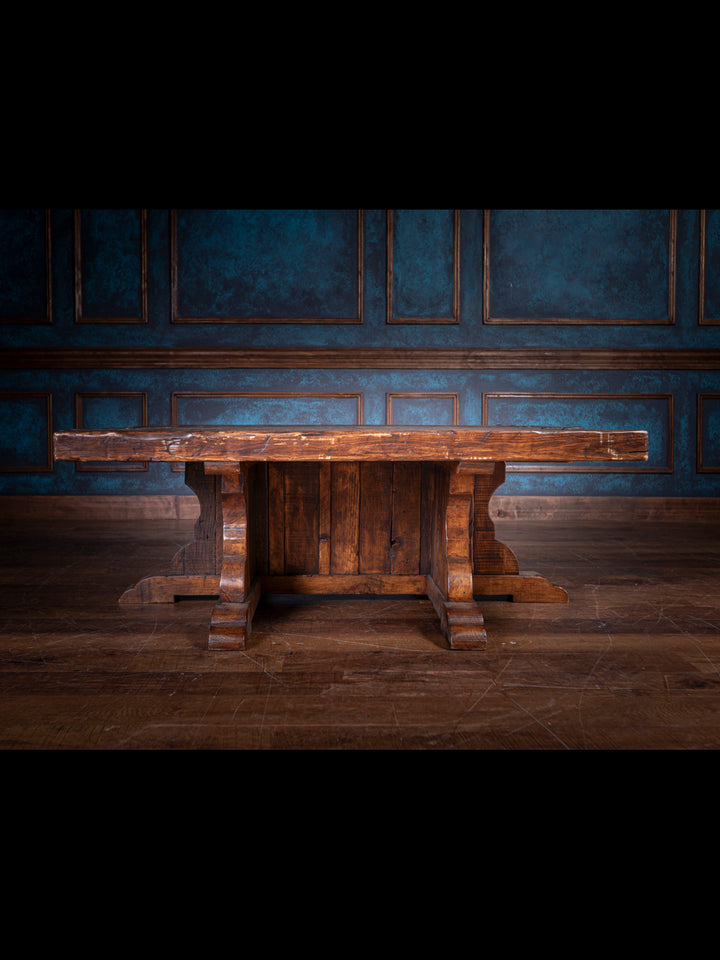 Wooden table against a blue paneled wall