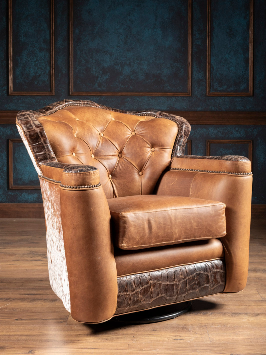 Golden Range Swivel Chair in full-grain brown leather with embossed crocodile accents in a western living room.