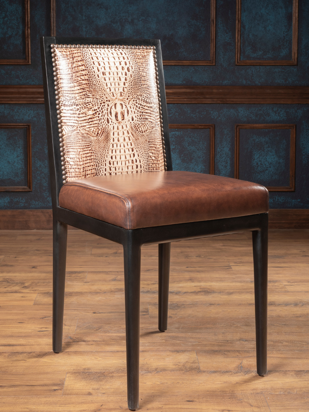 Ivory Crocodile Leather Armless Dining Chair with burnished brown leather seat and crocodile accents in dining space.