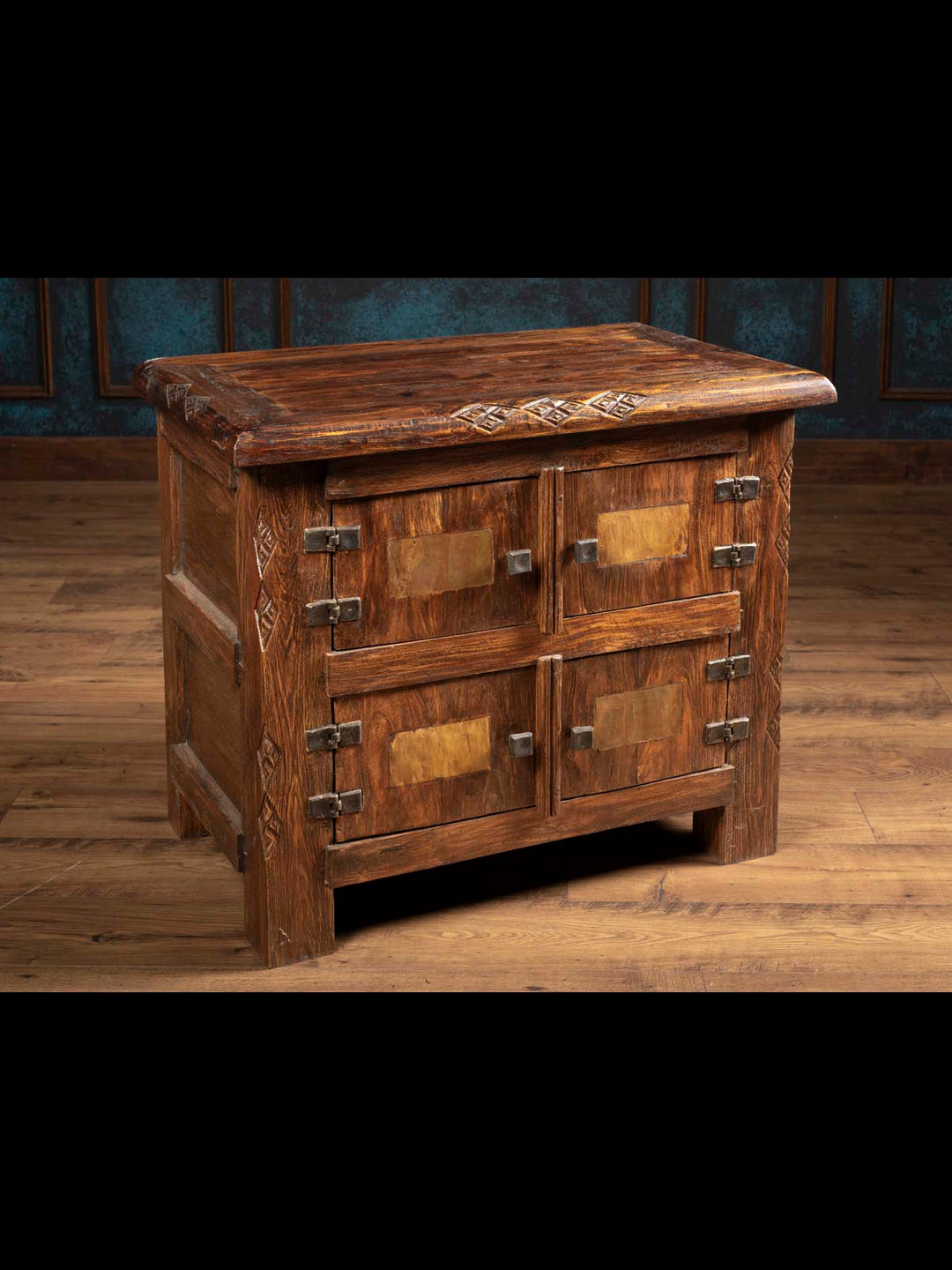 The Jason Scott 4 door bedside chest with stone inlay featuring hand carved reclaimed wood from the custom bedroom collection.