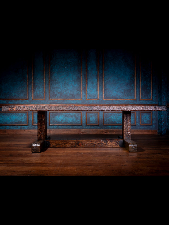 Knotty Alder Rustic Dining Table in solid knotty alder wood with dark rustic stain, hand-hewn edge and trestle base. 