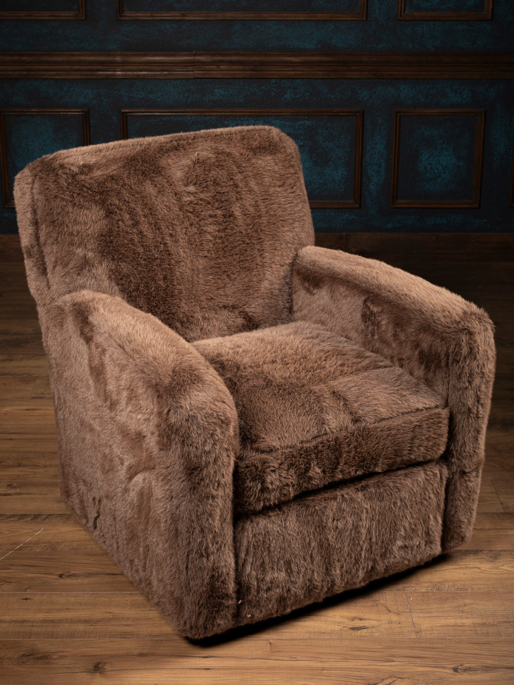 Elevated view of the Kodiak Grizzly-Brown faux fur swivel chair showing its seat cushion, upholstered back, and broad arms.