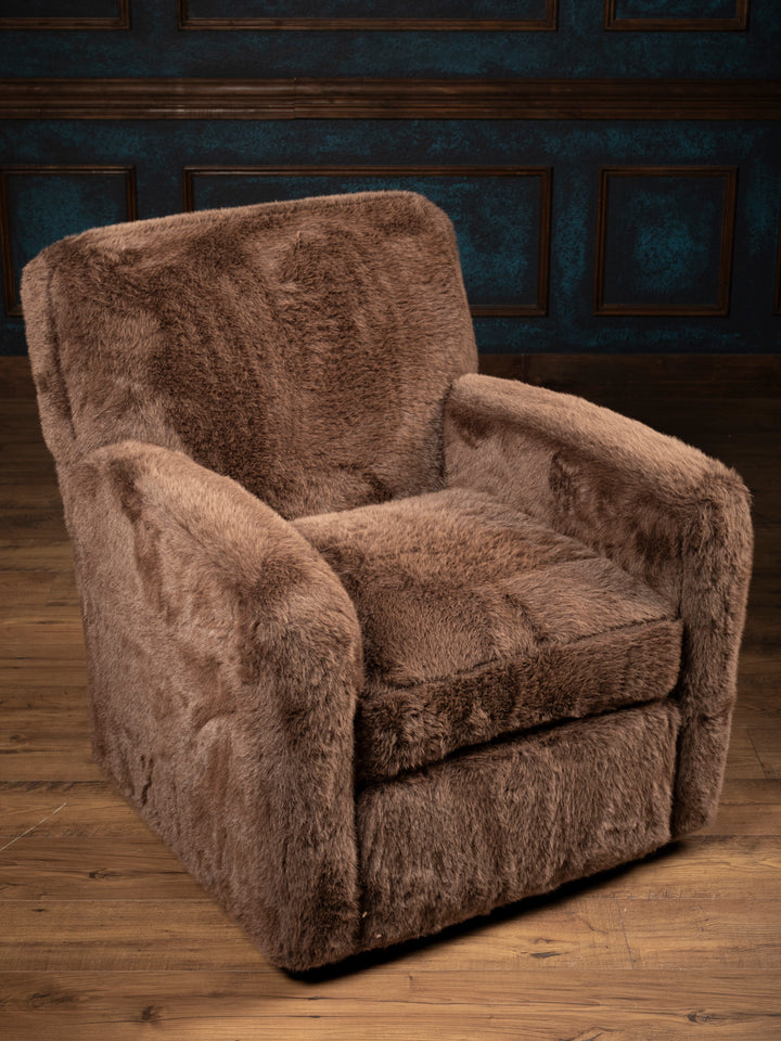 Elevated view of the Kodiak Grizzly-Brown faux fur swivel chair showing its seat cushion, upholstered back, and broad arms.
