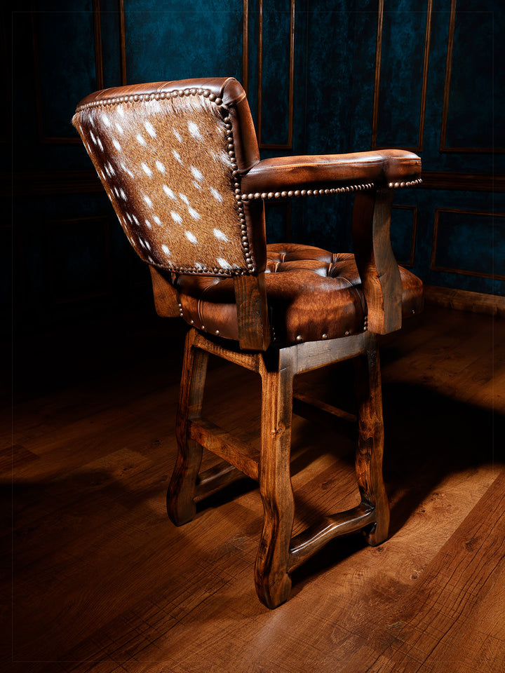 Lodge Axis Western Bar Stool with Axis hair-on hide back panel in a western room space.