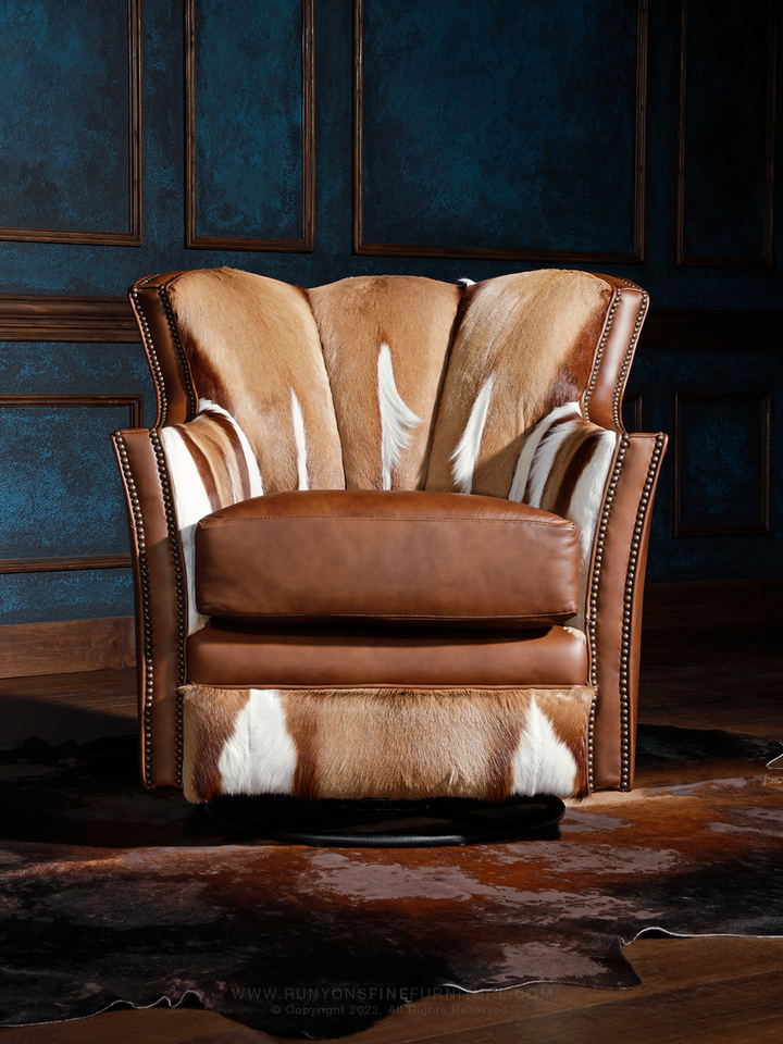front view shot of brown italian leather swivel chair with authentic springbok hair on hide interior.