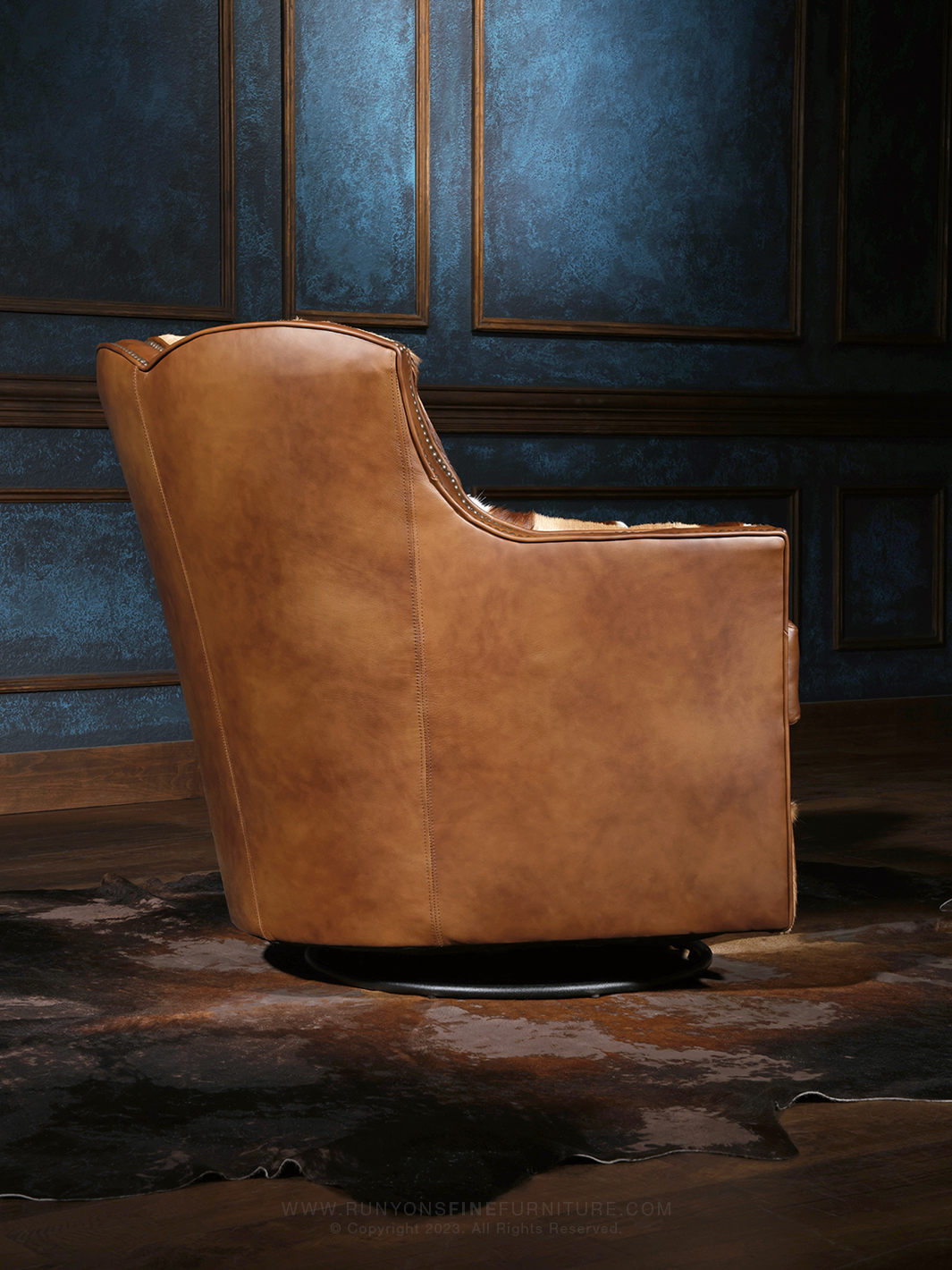 side view of brown italian leather swivel chair.