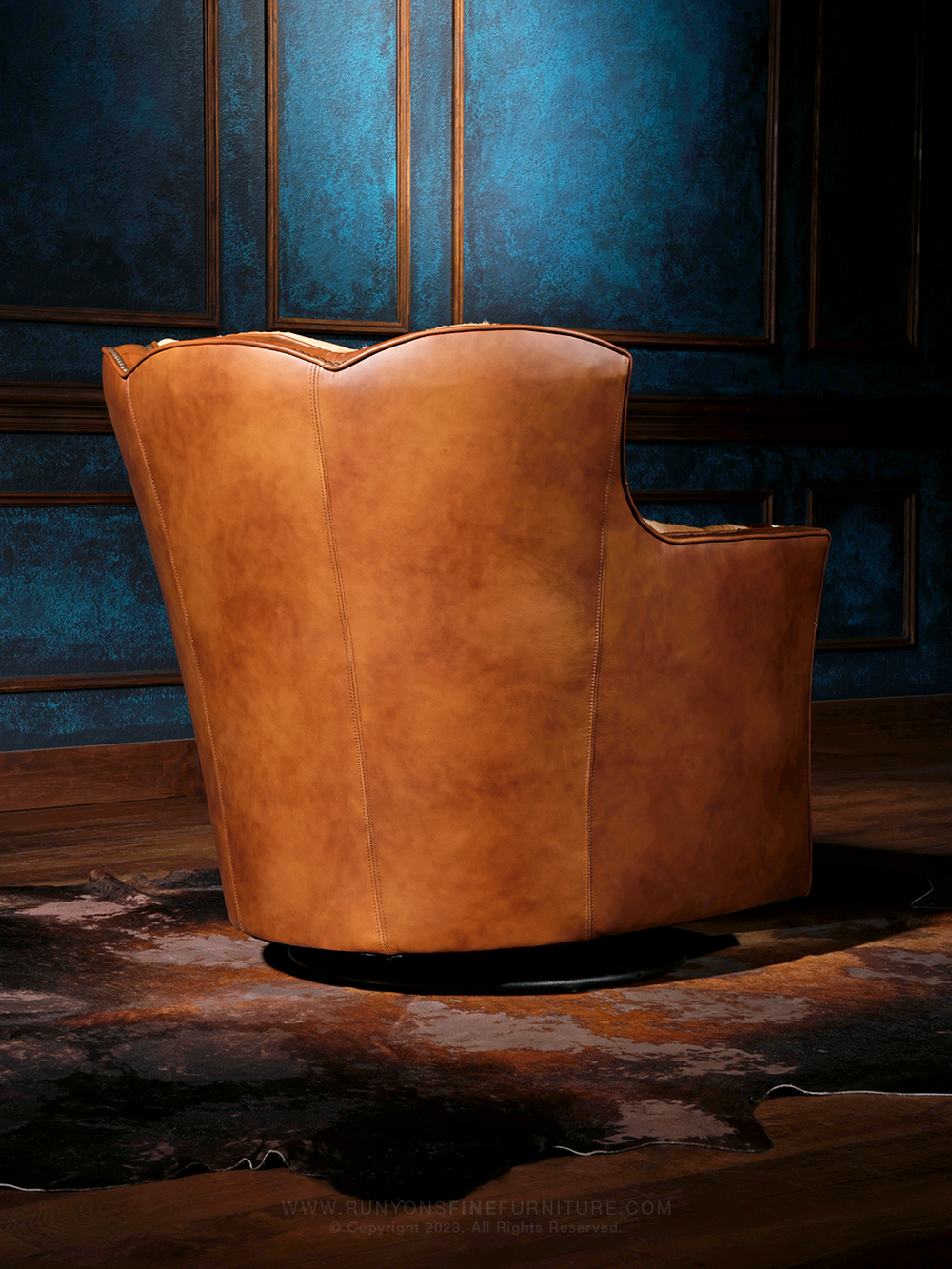 italian brown leather outside back on swivel chair.