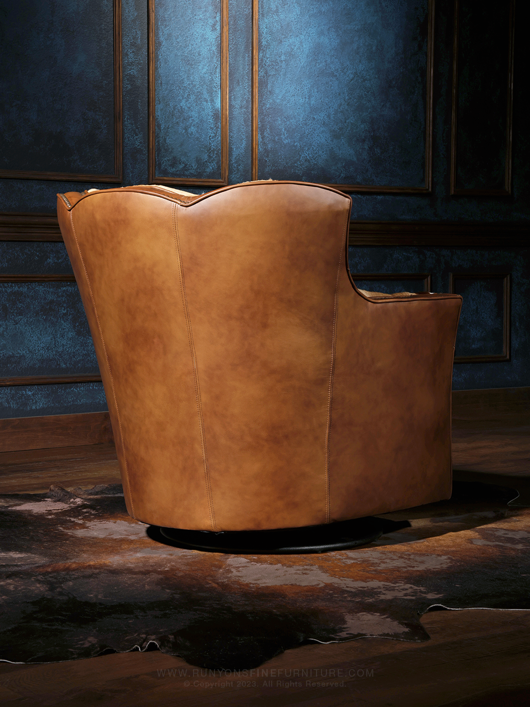 italian brown leather outside back on swivel chair.