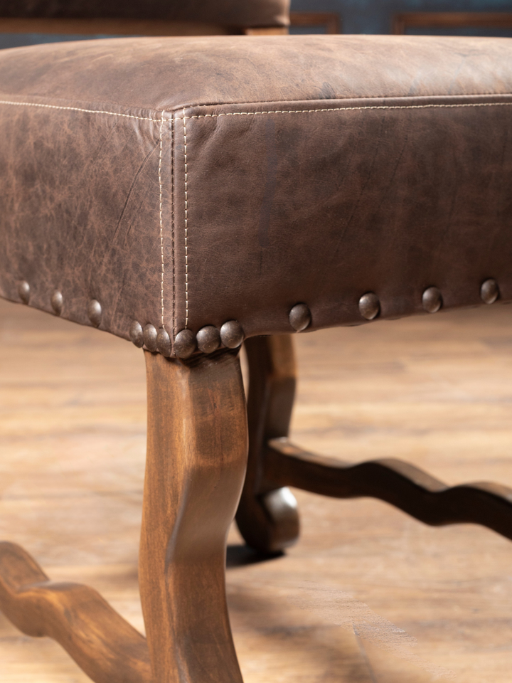 Mustang Leather Dining Chair crafted from solid hardwood with brown leather seats in a close-up view. 