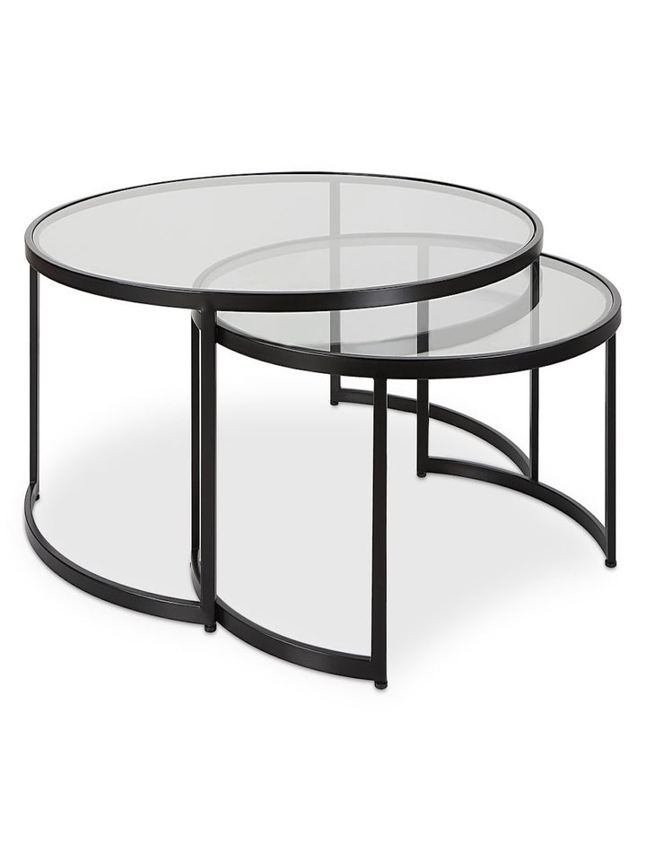 Set of two round glass tables with black metal frames on a white background