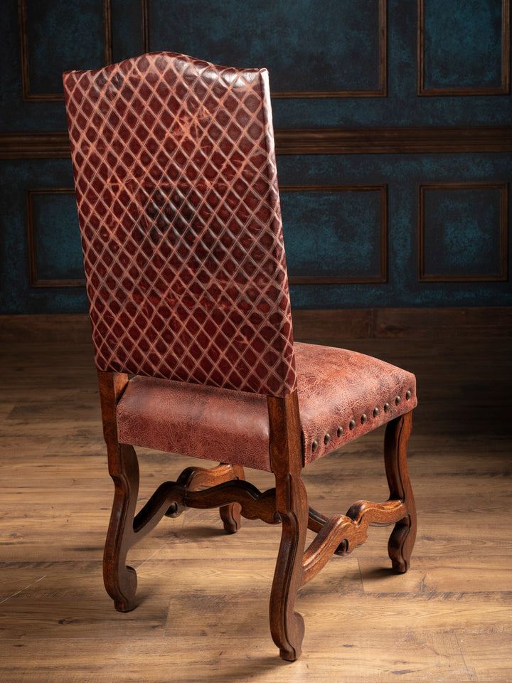 Back view of the Prescott leather dining chair with diamond-pattern full-grain leather and carved hardwood frame