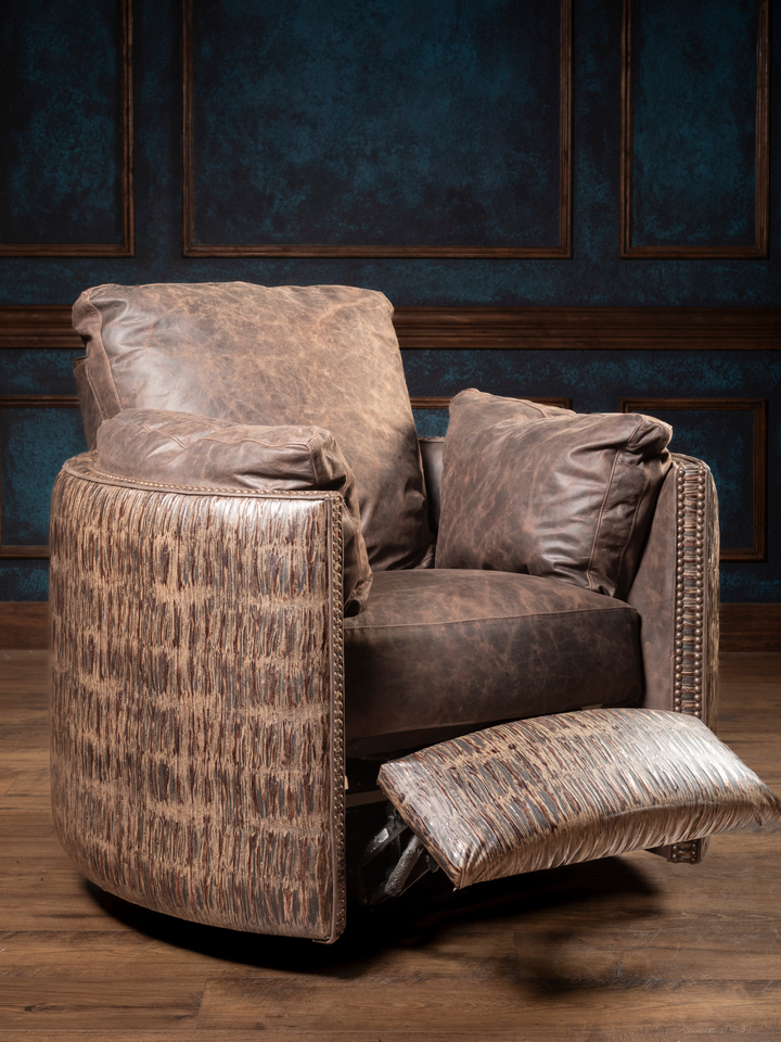 Rimrock Leather Snug Swivel Recliner shown in reclined position with pushback mechanism in a rustic space.