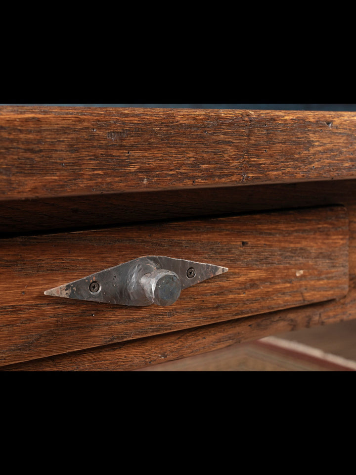 Wooden console surface with a metal bracket drawer 