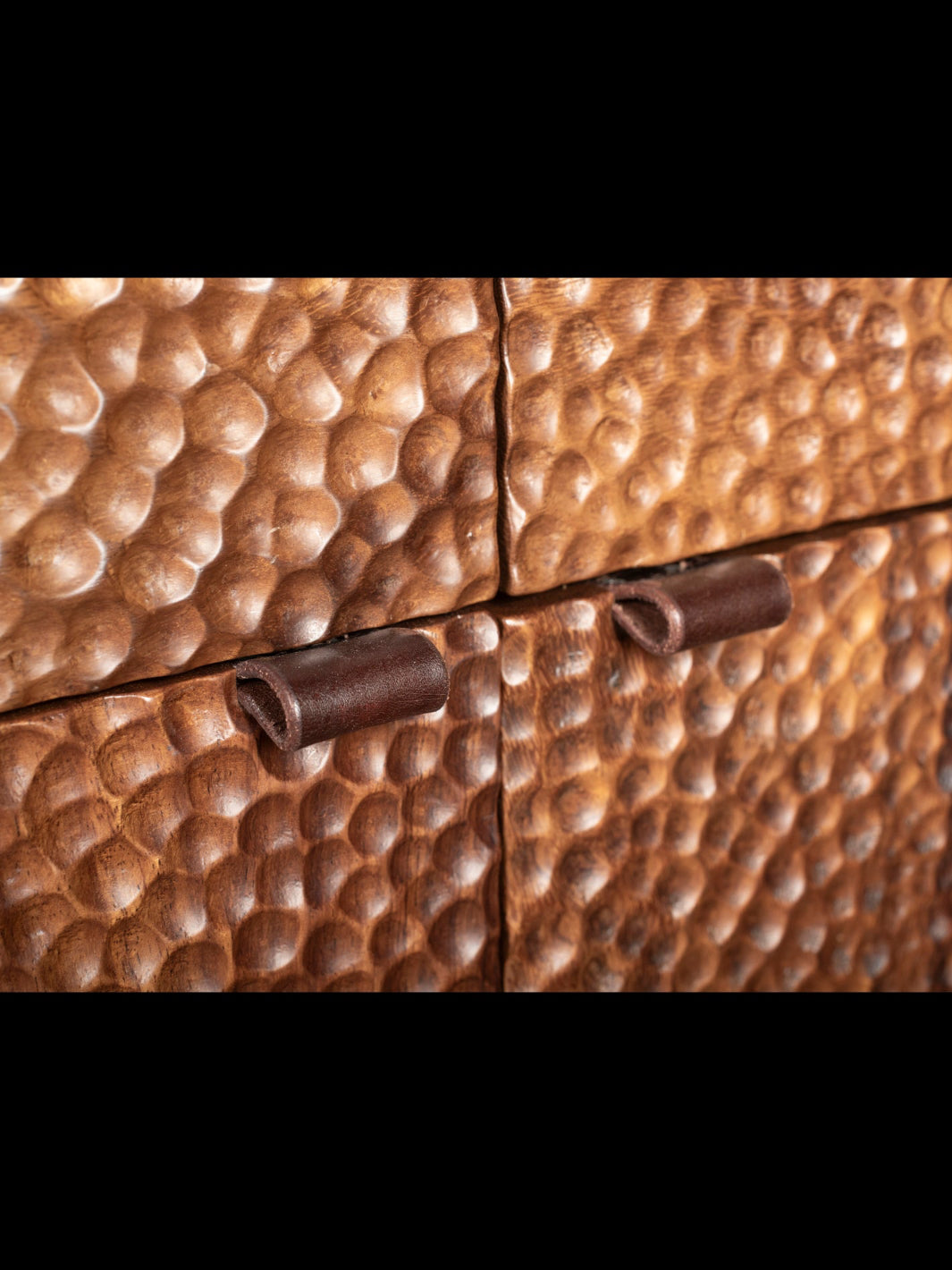 Close-up of a textured brown surface on side board
