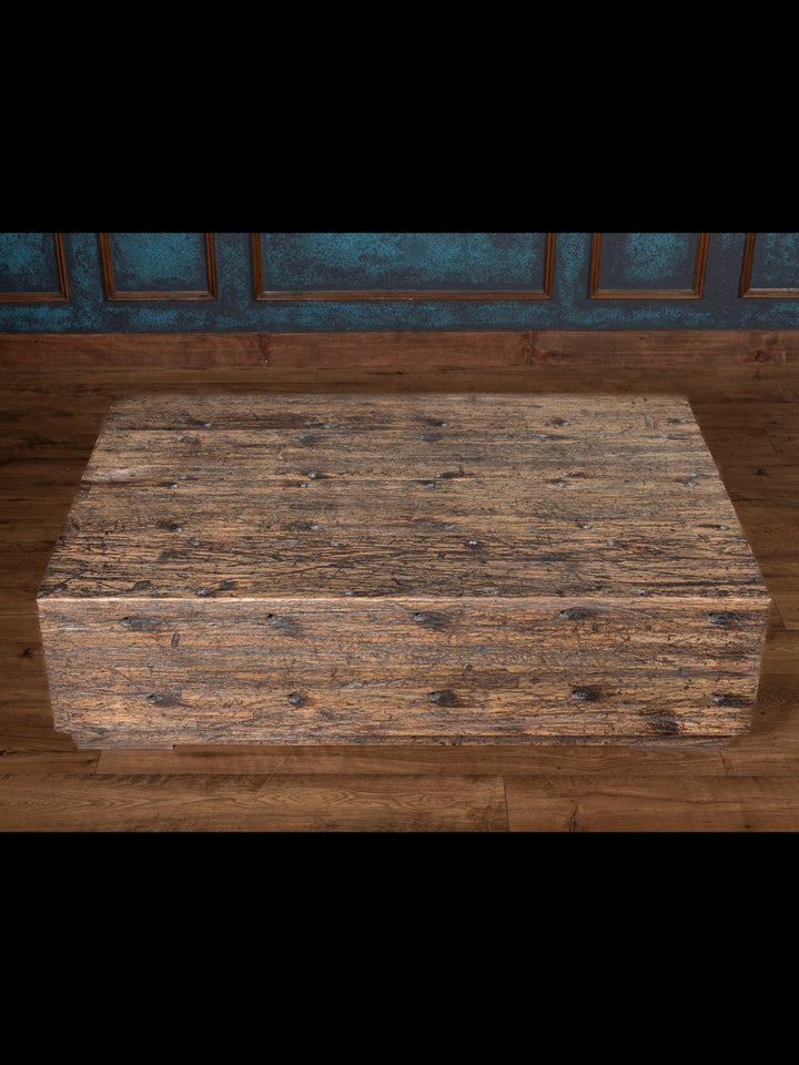 Reclaimed Oak Beam Coffee Table built from solid reclaimed oak and finished in a warm dark walnut tone.