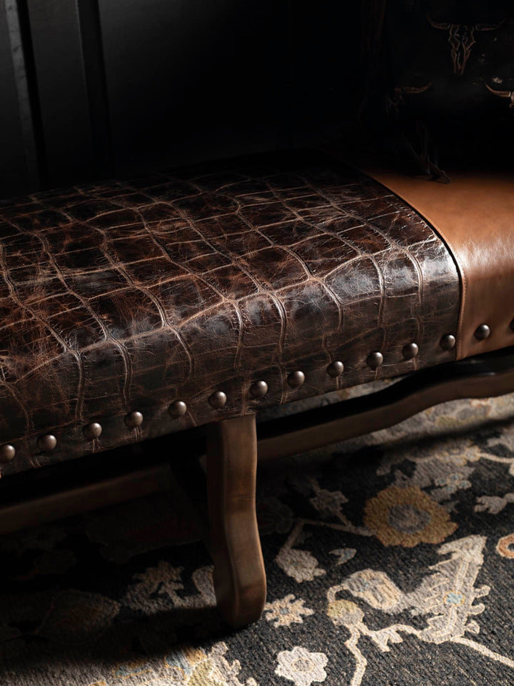 Close-up of the Santa Fe leather bench featuring jumbo crocodile-embossed leather, decorative brass nailhead trim, and handcrafted hardwood construction.
