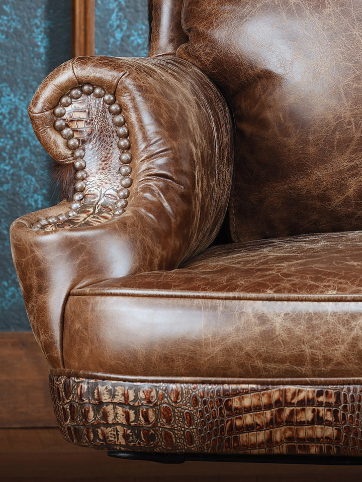 Santa Fe Western Desk Chair with brown leather seats and crocodile leather trim detailing in a close up view. 