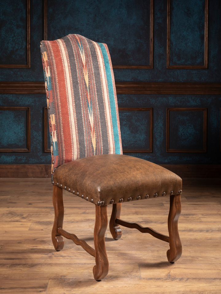 Southwestern Stripe Leather Dining Chair with southwestern strip fabric and leather seat in a western dining space.