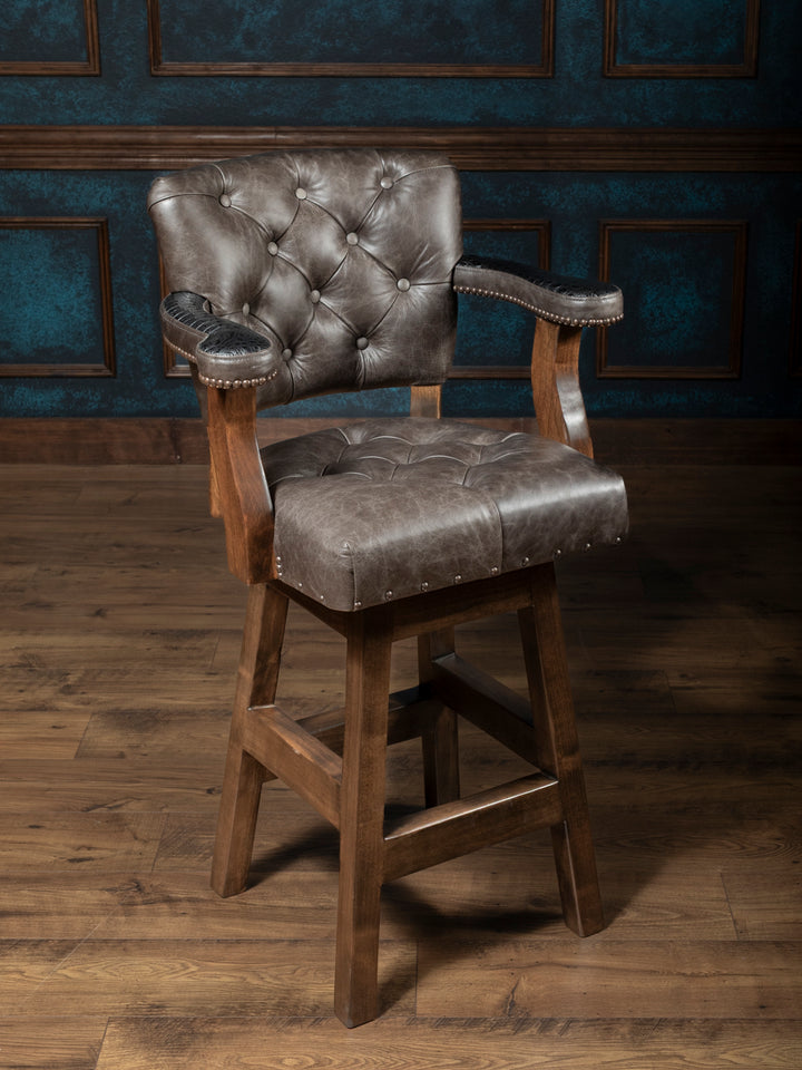 Tufted Greystone Leather Bar Stool in grey full grain leather with embossed black crocodile accents in a western bar space.