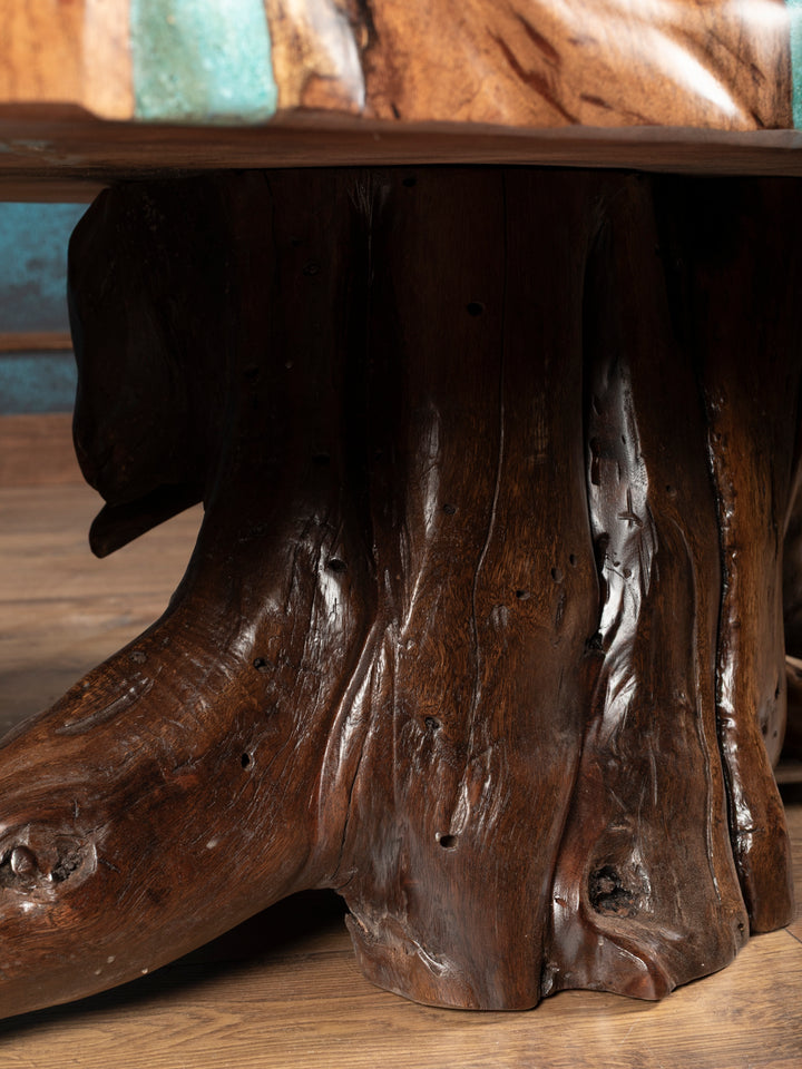 Close-up of the Turquoise Inlay Mesquite Coffee Table’s sculptural wood base, showing natural contours and grain.
