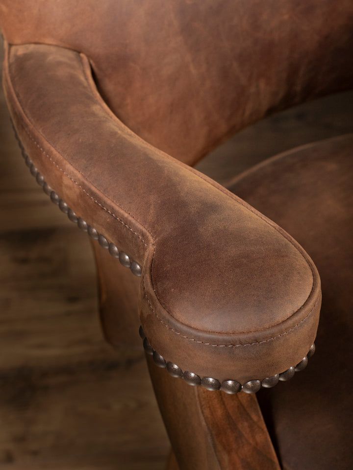 Western Heritage Barstool in aniline leather with soft waxed matte effect in a studio setting.