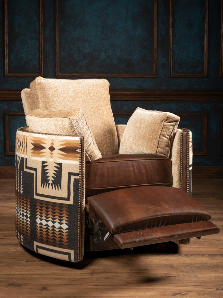 The Adobe Trail western leather reclining swivel chair shown fully extended in an open pushback position with a concealed brown patina leather footrest.