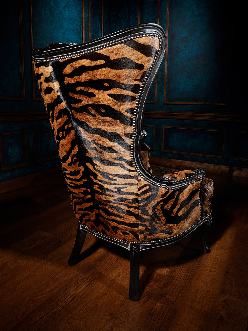back view of leather/fabric accent chair with tiger stripe design