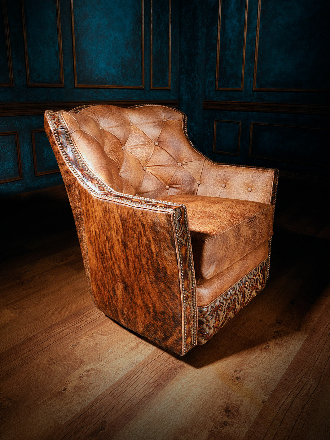 brown cowhide and embossed leather swivel chair