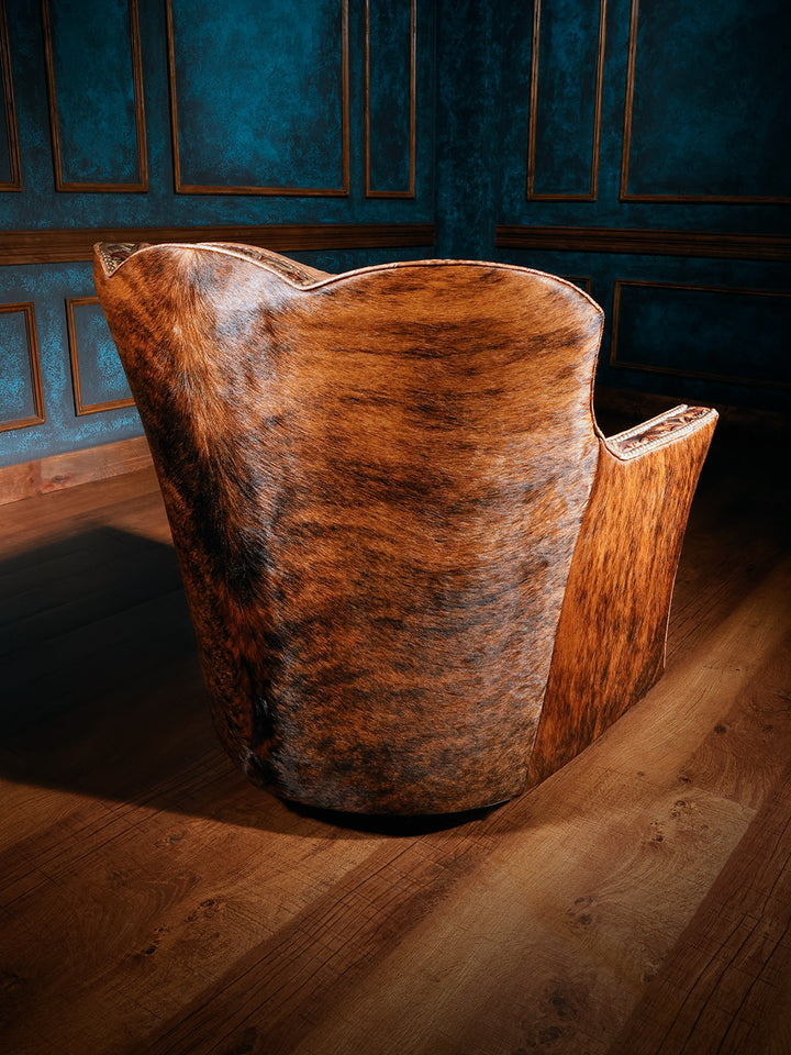 rear view of brown cowhide and embossed leather swivel chair