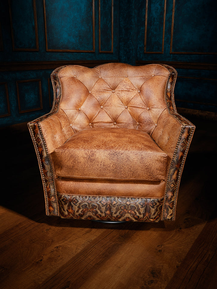 front view of brown cowhide and embossed leather swivel chair