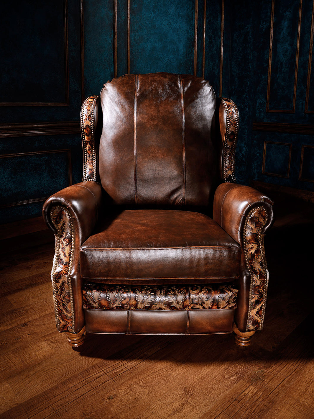 Blackstone Western Leather Recliner in distressed brown leather with embossed Western detailing, shown in a rustic interior setting.