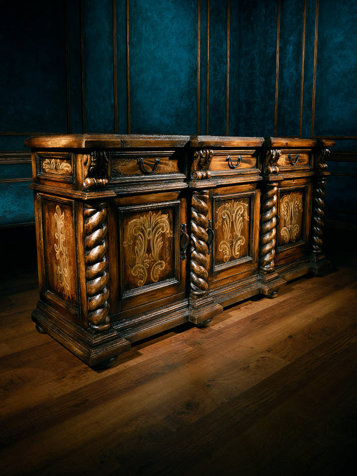 side view of carved wooden buffet with 3 doors