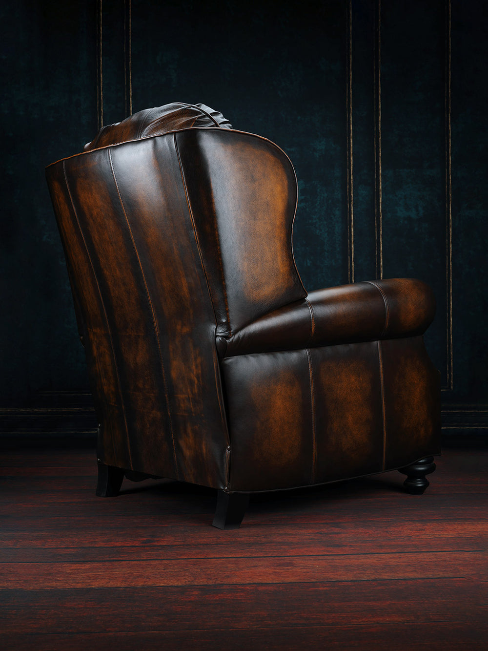rear view of dark brown burnished leather recliner