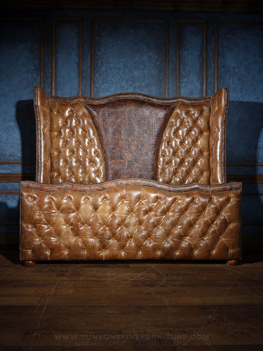 Crocodile Dundee Leather Tufted Bed in Cambridge leather with embossed crocodile accents, in a Western room setting.