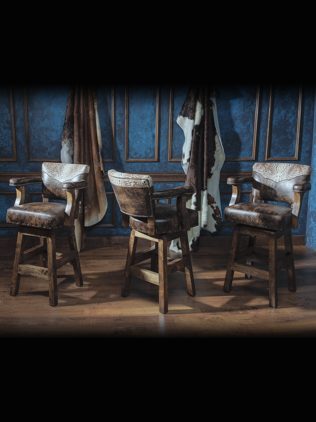 Kryptonite Cowboy Western Bar Stool shown in a rustic bar scene with western accents.