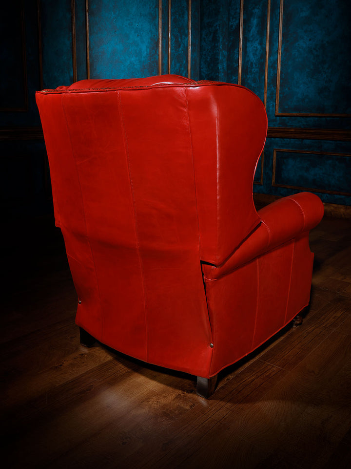 Red Rider Western Leather Recliner in distressed Ruby Red leather on outside back and arms in a spacious rustic lodge room.