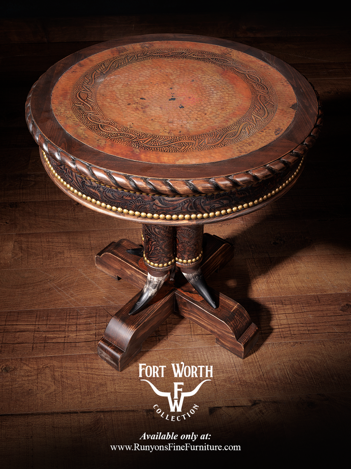 Western Steer Pedestal End Table with a round copper top framed by wood trim, styled in a dark living space.